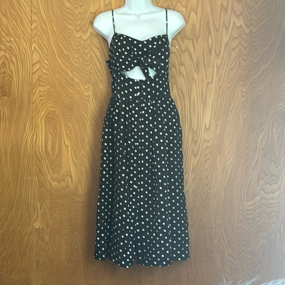Black and white polka dot cutout dress with tie bow. Maxi. Spaghetti straps